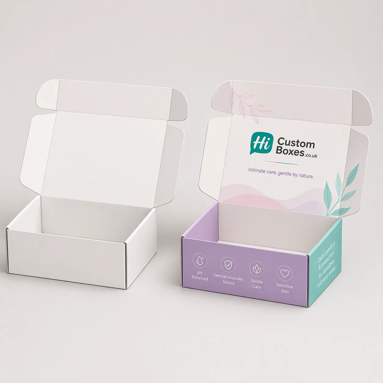 A plain white retail box standing next to a purple floral branded intimate cream box. class=